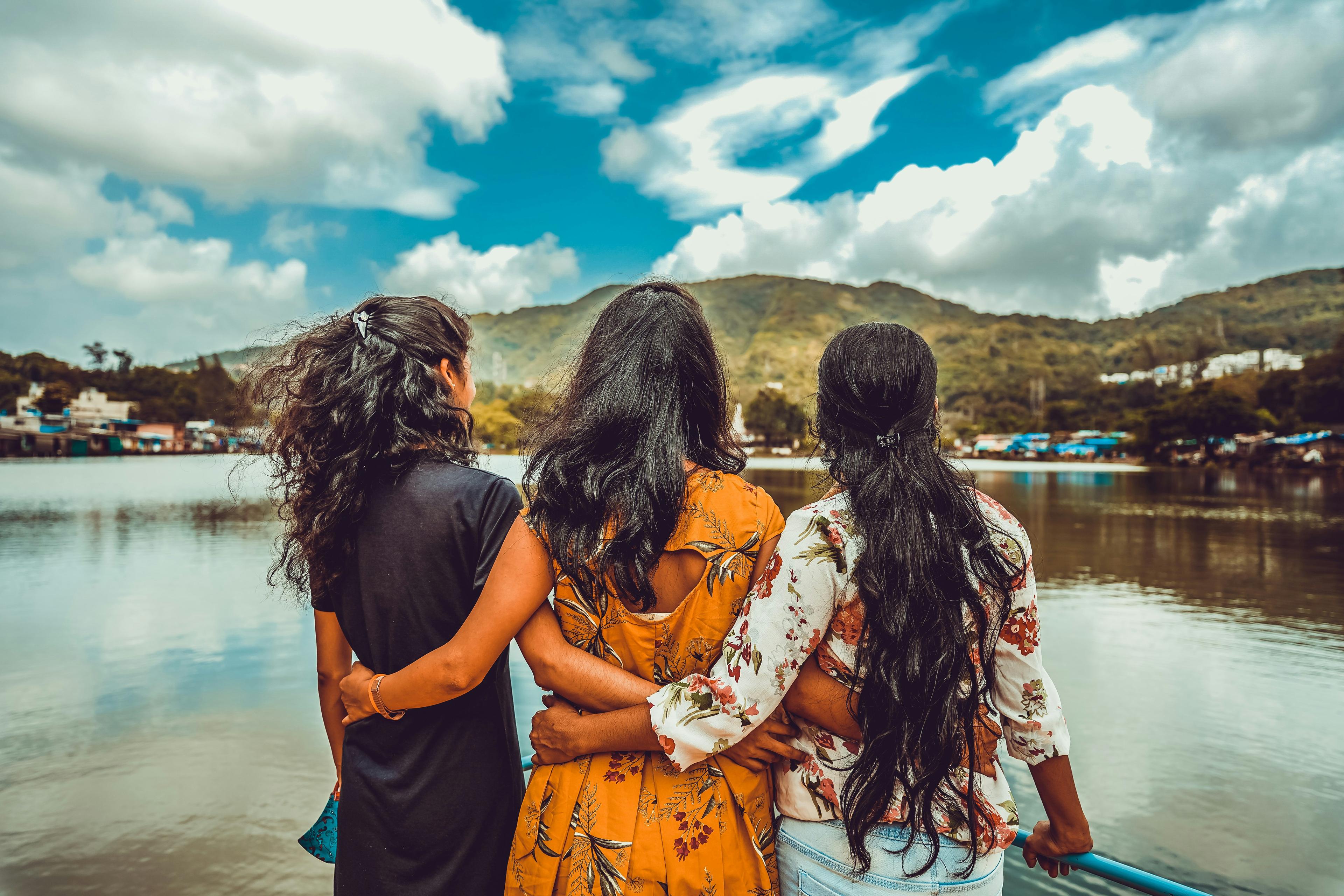 A group of friends seen from back.